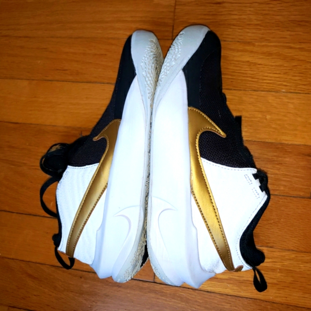 Black and White Sneakers with Gold Swoosh